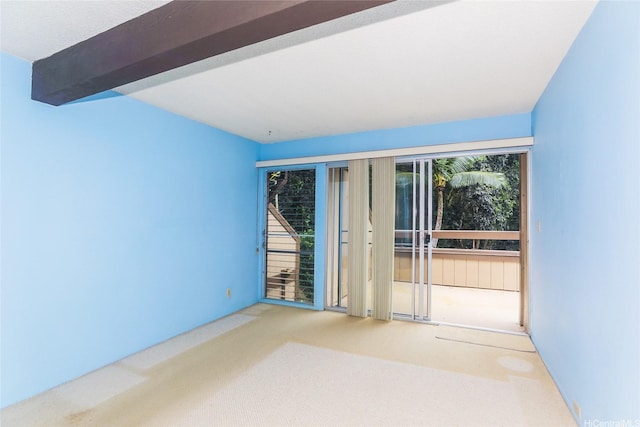 47-6827 Hui Kelu St Unit 6707, Kaneohe, HI 96744 - empty room featuring carpet floors and beam ceiling