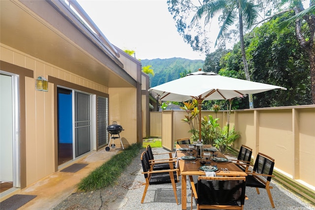 47-6827 Hui Kelu St Unit 6707, Kaneohe, HI 96744 - view of patio with a mountain view, outdoor dining space, and grilling area