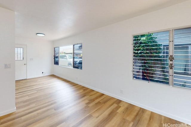 84-562 Nukea St, Waianae, HI 96792 - unfurnished room with light wood finished floors and baseboards