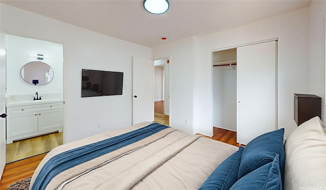 84-562 Nukea St, Waianae, HI 96792 - bedroom with light wood-style flooring, a closet, and connected bathroom