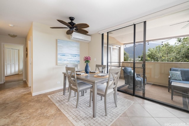 dining area with a wall mounted air conditioner, baseboards, plenty of natural light, and a ceiling fan