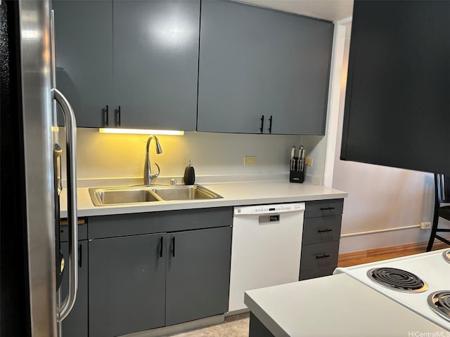 700 Richards St Unit 2403, Honolulu, HI 96813 - kitchen featuring white dishwasher, freestanding refrigerator, a sink, and gray cabinets