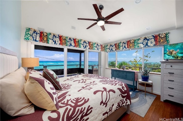 bedroom with visible vents, a ceiling fan, wood finished floors, access to exterior, and vaulted ceiling