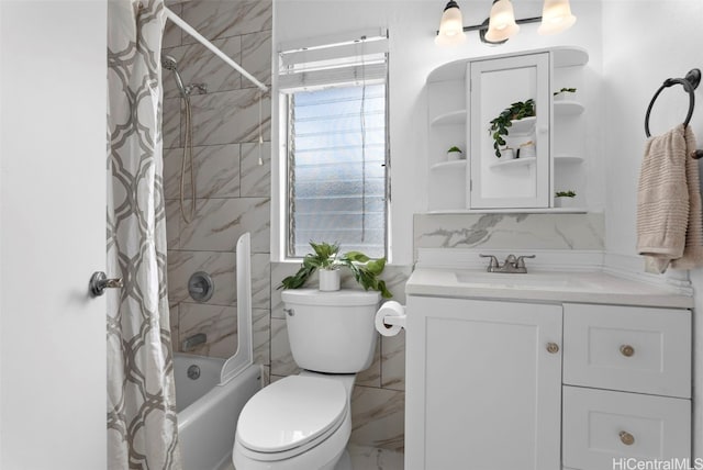 bathroom featuring toilet, shower / tub combo with curtain, and vanity