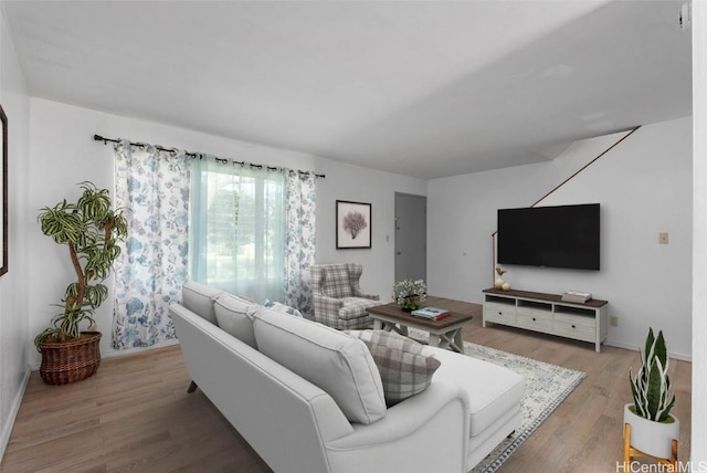 living room featuring light wood-style flooring