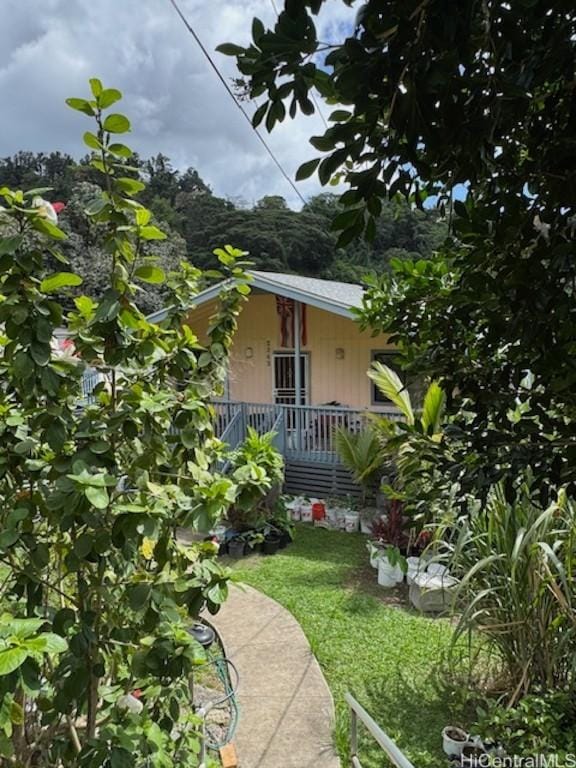 view of yard with covered porch