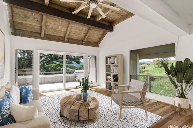 living area featuring ceiling fan, high vaulted ceiling, wood finished floors, wood ceiling, and beamed ceiling