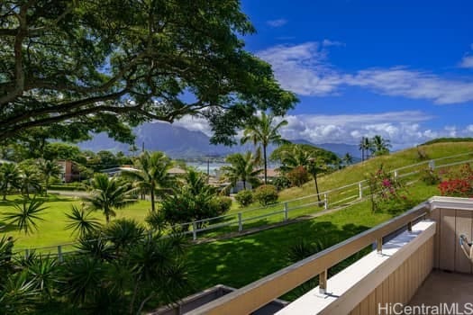 balcony featuring a mountain view