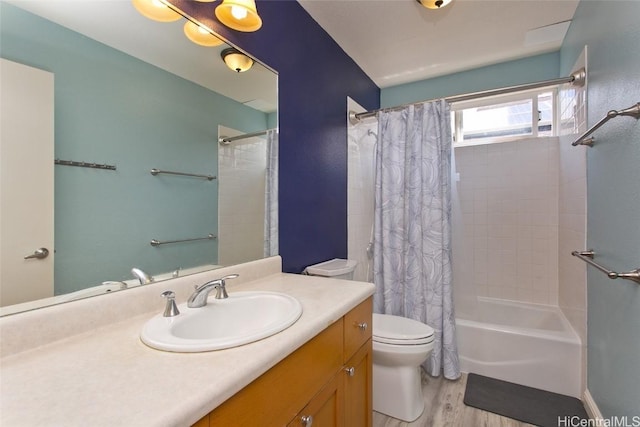 full bath with shower / bath combination with curtain, vanity, toilet, and wood finished floors