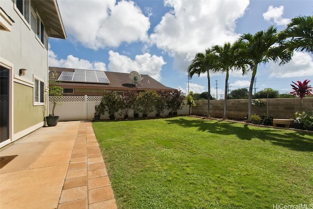 view of yard featuring a patio area and a fenced backyard