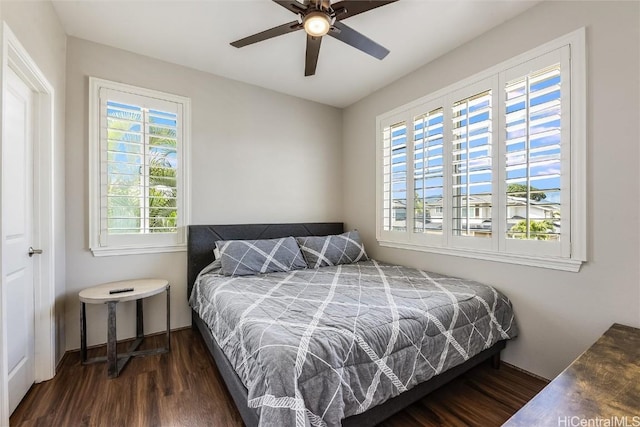 bedroom featuring ceiling fan and wood finished floors