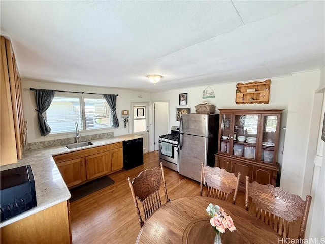 dining room with light wood finished floors