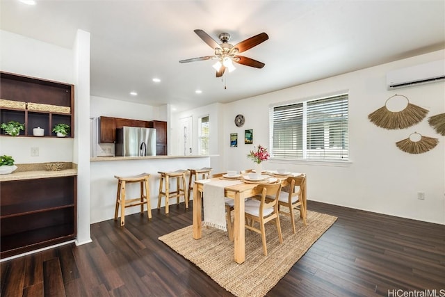 dining space with dark wood-style floors, recessed lighting, an AC wall unit, and a ceiling fan