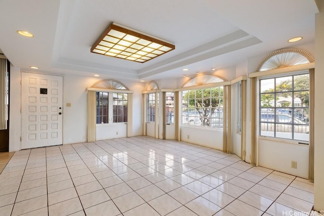 94-1377 Hiaai Pl, Waipahu, HI 96797 - unfurnished room featuring light tile patterned floors, a raised ceiling, and recessed lighting