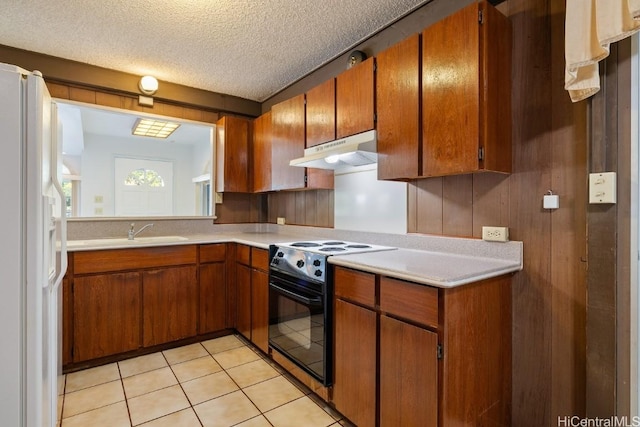 94-1377 Hiaai Pl, Waipahu, HI 96797 - kitchen with under cabinet range hood, white fridge with ice dispenser, black / electric stove, and brown cabinetry