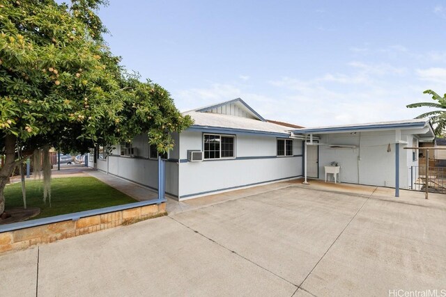 94-1377 Hiaai Pl, Waipahu, HI 96797 - ranch-style home with a patio, a front lawn, cooling unit, and stucco siding
