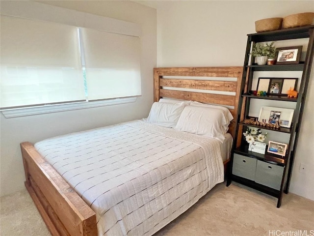 bedroom with light carpet