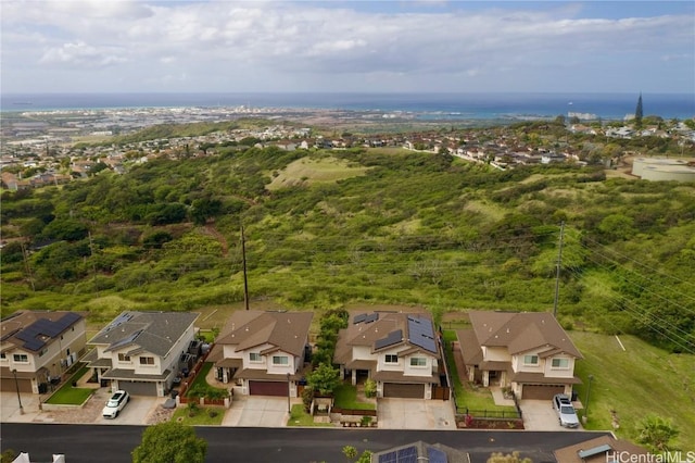 birds eye view of property with a residential view