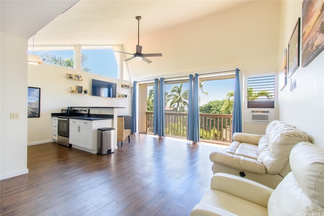 84-754 Ala Mahiku St Unit 31C, Waianae, HI 96792 - living area featuring plenty of natural light, dark wood finished floors, a towering ceiling, and ceiling fan