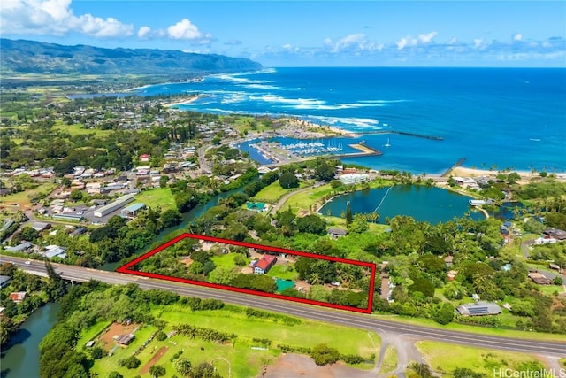 birds eye view of property featuring a water view