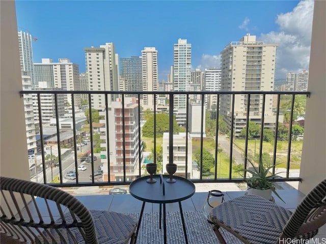 balcony featuring a city view