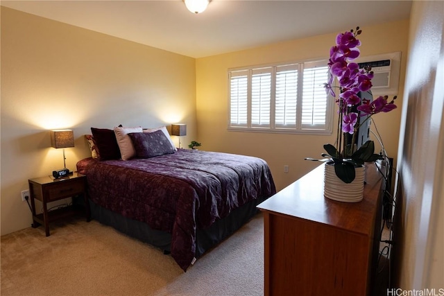 bedroom featuring light carpet