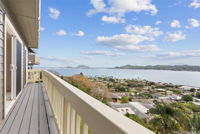 balcony featuring a water view