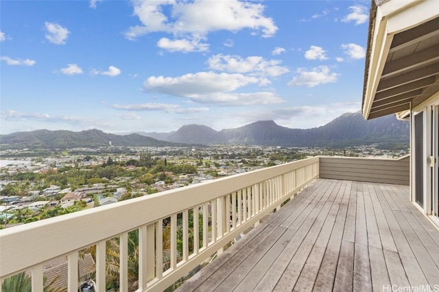 wooden terrace with a mountain view