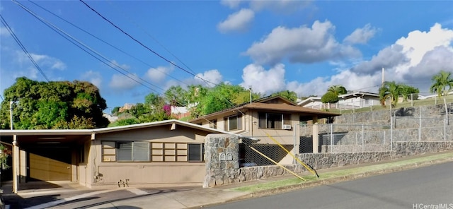 view of front of house with fence