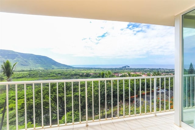 balcony featuring a mountain view