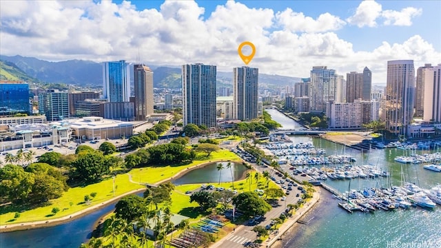 bird's eye view featuring a water view and a city view