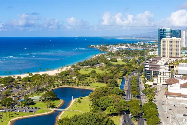 birds eye view of property featuring a water view and a city view