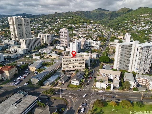 birds eye view of property featuring a view of city and a mountain view