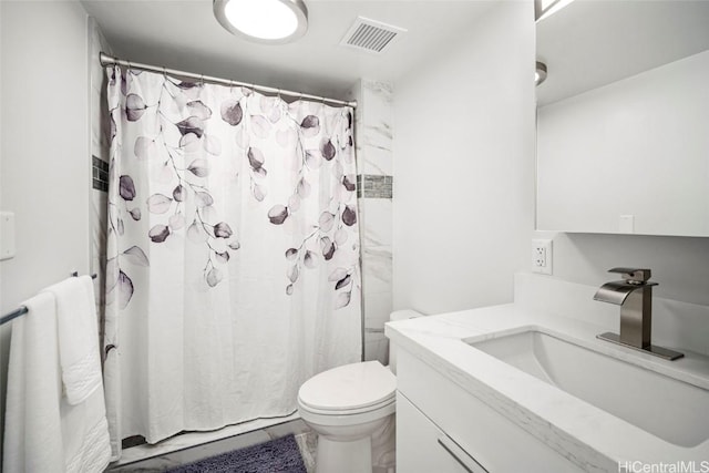 bathroom with toilet, curtained shower, visible vents, and vanity