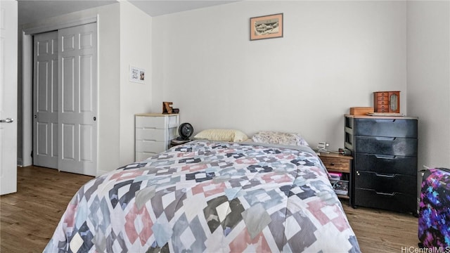 bedroom featuring wood finished floors