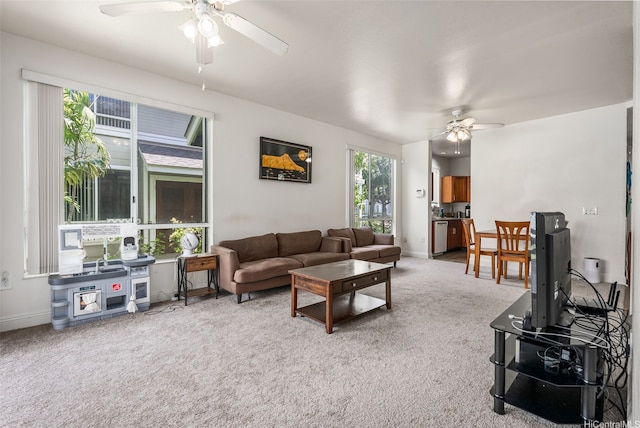 91-1058 Kekuilani Loop Unit 1804, Kapolei, HI 96707 - living room with a ceiling fan, baseboards, and carpet floors