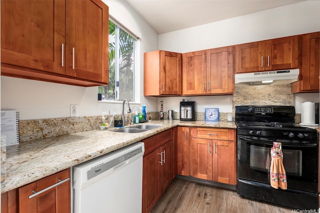 91-1058 Kekuilani Loop Unit 1804, Kapolei, HI 96707 - kitchen featuring under cabinet range hood, a sink, white dishwasher, light wood-type flooring, and black gas stove