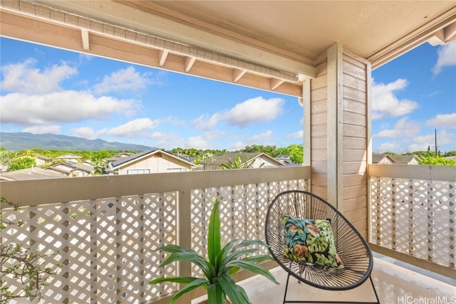 balcony featuring a mountain view