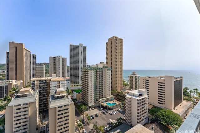 property's view of city with a water view