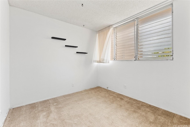 94-414 Kapuahi St Unit 23, Honolulu, HI 96789 - carpeted spare room with a textured ceiling