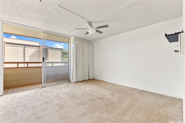 94-414 Kapuahi St Unit 23, Honolulu, HI 96789 - carpeted empty room featuring a ceiling fan and a textured ceiling