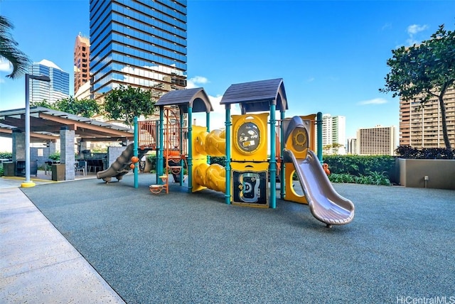 community play area with a view of city