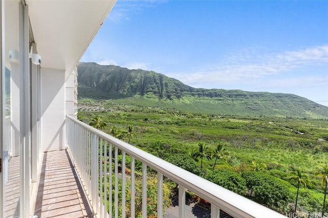 balcony featuring a mountain view