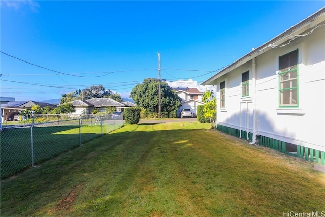 view of yard featuring fence