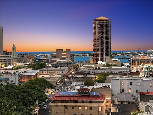 property's view of city featuring a water view