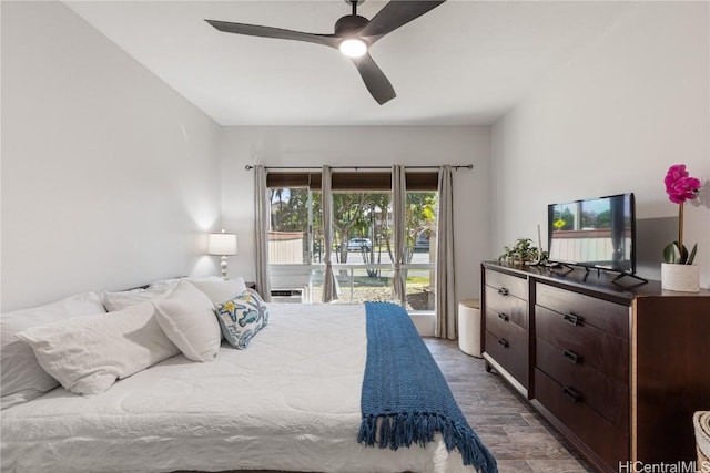 bedroom with a ceiling fan and wood finished floors