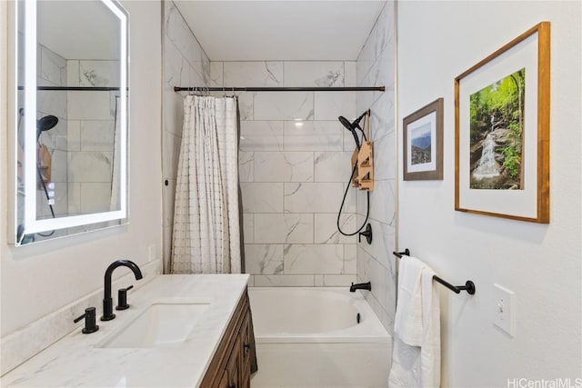 full bath featuring vanity and shower / tub combo