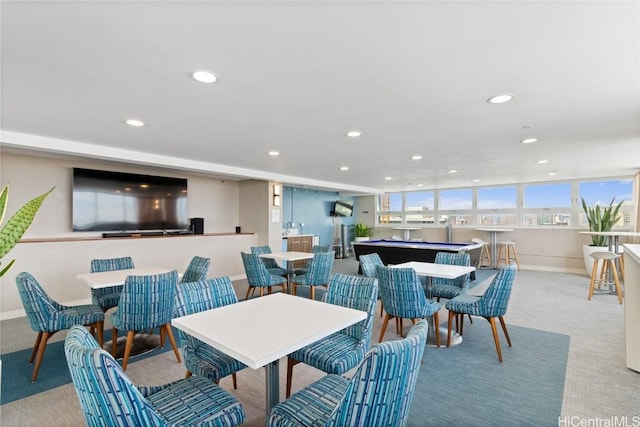 carpeted dining area with recessed lighting and baseboards