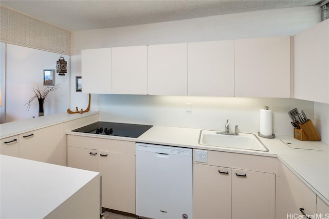 kitchen with black electric stovetop, a sink, white cabinets, light countertops, and dishwasher