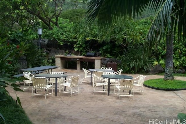 view of patio with outdoor dining area